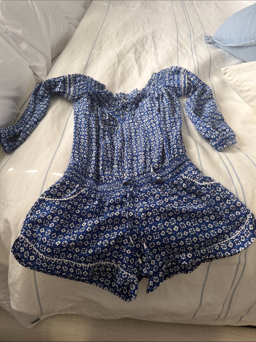 Poupette St. Barth Blue and White Floral Off-Shoulder Romper